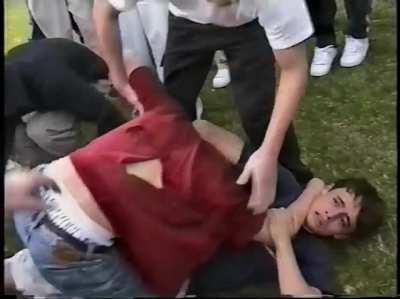 Guys fighting in the neighborhood