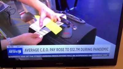 The fkry is real everyone, NY1 is speaking about ridiculous CEO bonuses & pay, and using GameStop store photo in the background.