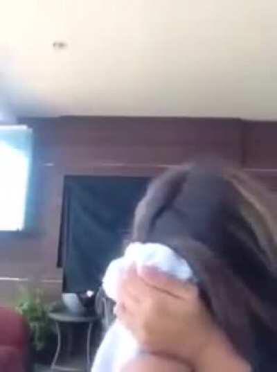 Putting Lemon juice on her eyes