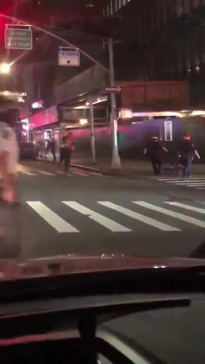 People stuck in traffic are witnessing NYPD beat up folks on their way home.