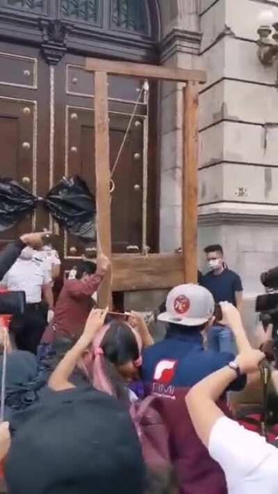 Guatemalan bring Guillotine to parliament