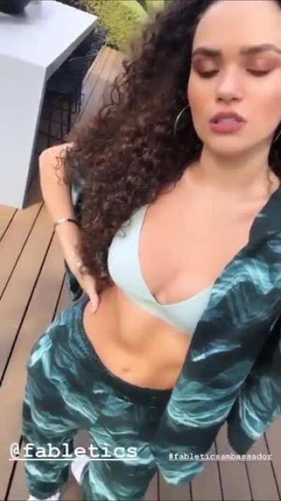 Fabletics outfit showing her cleavage