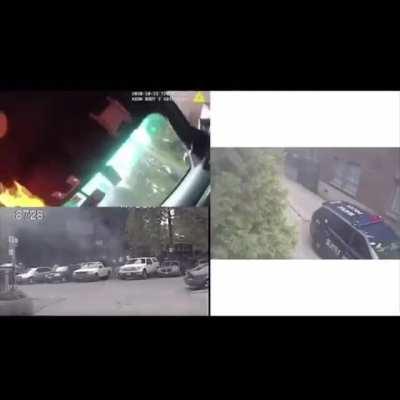 Man in Seattle throws a burning piece of wood into a police car