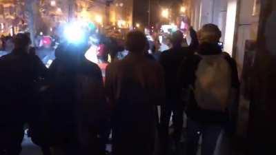 Proud boys surround a man who then stabs one of them.