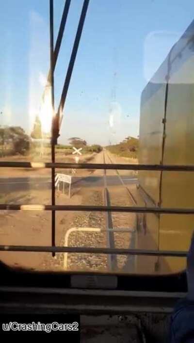 TRAIN MISSES CAR BY AN INCH!