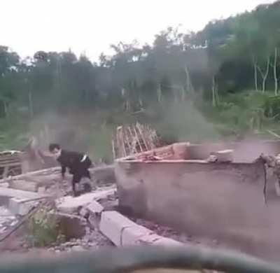 Pretending you're super strong.