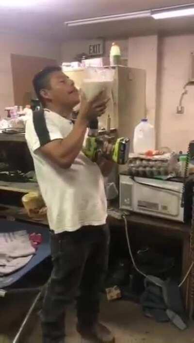 Using the blender cup connected to the drill... Einstein would be jealous of the genius.