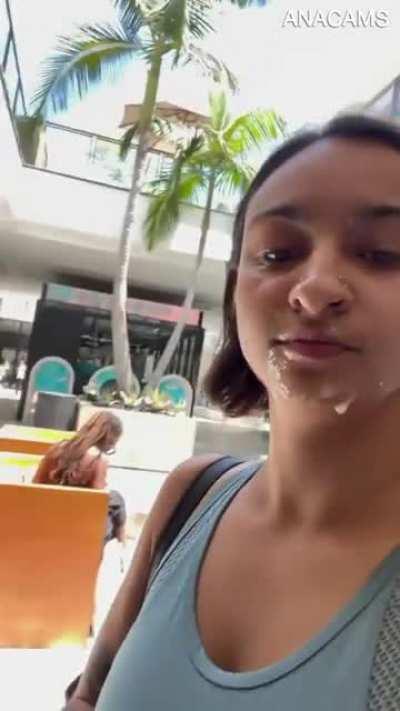 walking around with cum on her face
