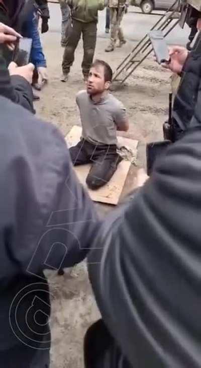 One of Moscow's Crocus City Hall terrorists shaking like a leaf during interrogation.