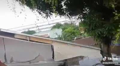 Family stuck on the the roof of their house for 12 hours after their house floods in Central America. 2nd hurricane in a month.