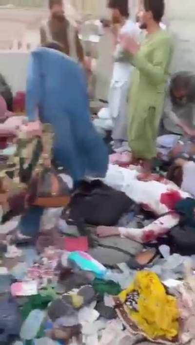 [Graphic] Several dead and injured including US military personals and citizens after terrorist attack outside Kabul Airport. #ShameOnBiden