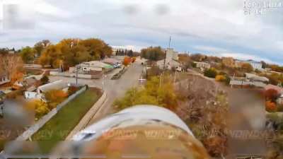 Russian fiber optic FPV drone hit an Ukrainian pickup truck near a destroyed bridge in Pokrovs'ke, Dnipropetrovsk region