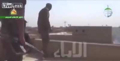 Isis fighters burning alive after getting hit with a grenade from Iraqi volunteers during the battle of Baiji,2015.