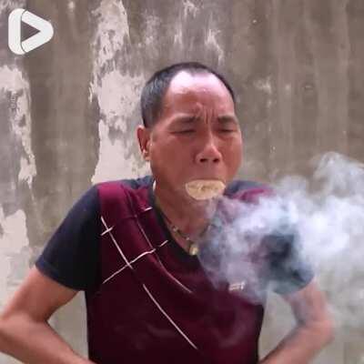Man creates fire using just his mouth