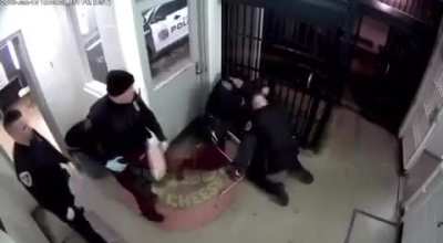 Ex-Indiana officer gets 1 year in federal prison for repeatedly punching handcuffed man