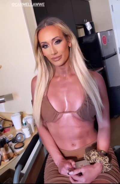 she is just wearing a bra as a top