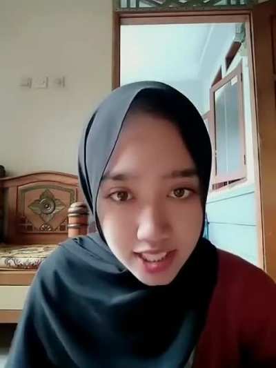 Indonesian hijabi showing her soles