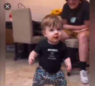 The baby, who was expected to take the first step, suddenly started dancing