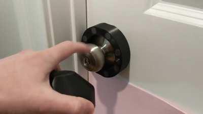 Made a cover to stop the cats from hitting the doorknob at night