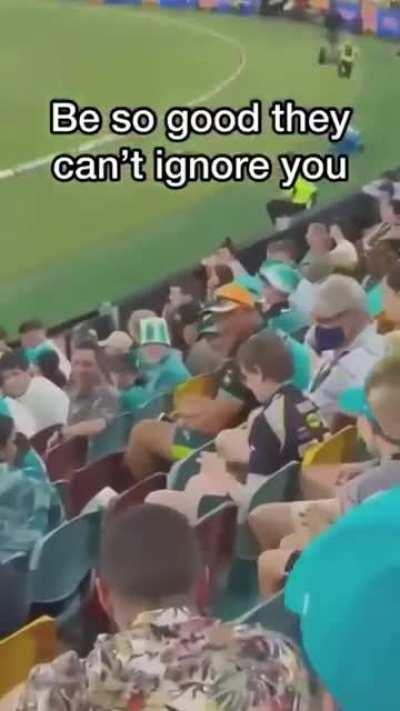 Fans are cheering for a teen solving a Rubik’s cube.