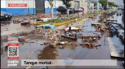 People running for their lives from a giant tank rupturing at Pepsi Co in Peru 