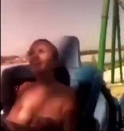 Exposed titties on roller coaster