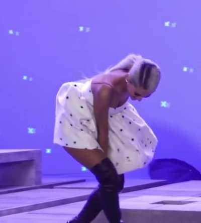 Leg Kick and Flowing Skirt