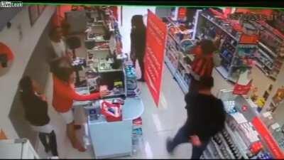 Robber pretends to be armed and gets arrested by a security guard also pretending to be armed