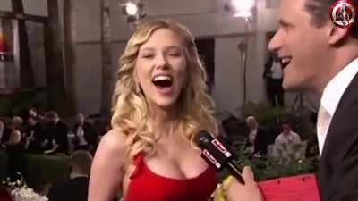 Interviewer feeling up a woman