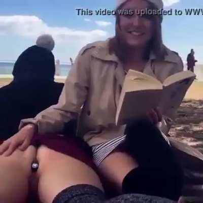 Enjoying a Good Book on The Beach