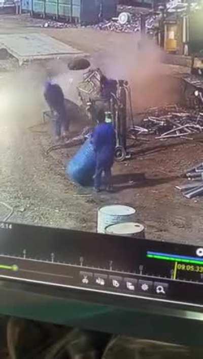 WCGW cutting a barrel with a torch.