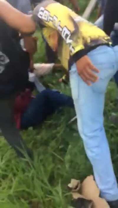 Its seems that in Brasil whooping thieves asses is accepted by police.