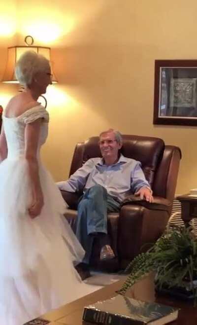 Grandma tries on her wedding dress after 60 years