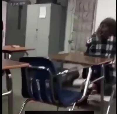 Guy gets slammed repeatedly in classroom.