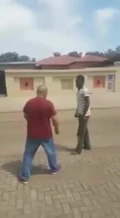 Guy throws rock, almost gets killed by a rock