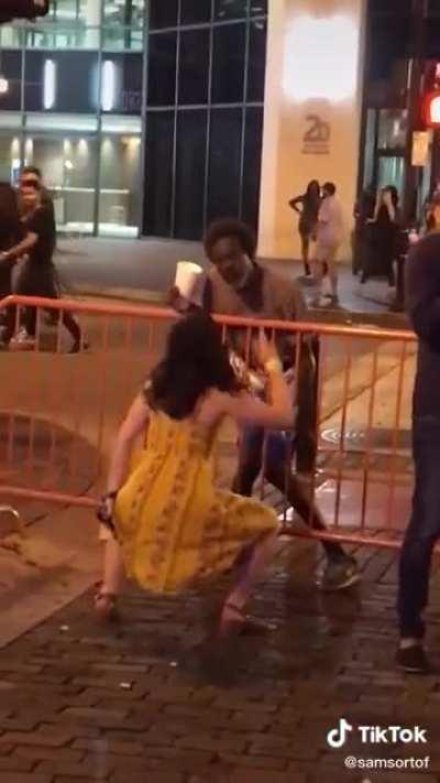 Lady vibes out with a homeless dude