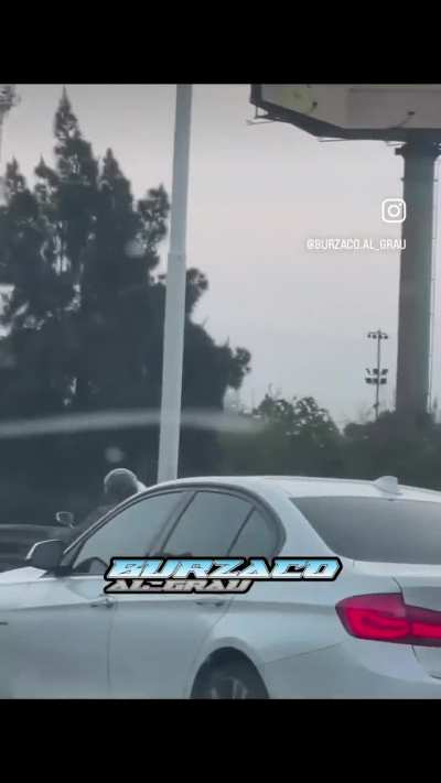 Trying to fight while riding bikes in the highway