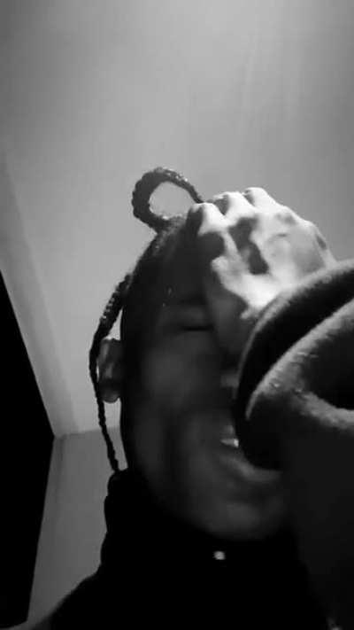 Travis Scott makes cringe reaction while failing to say sorry