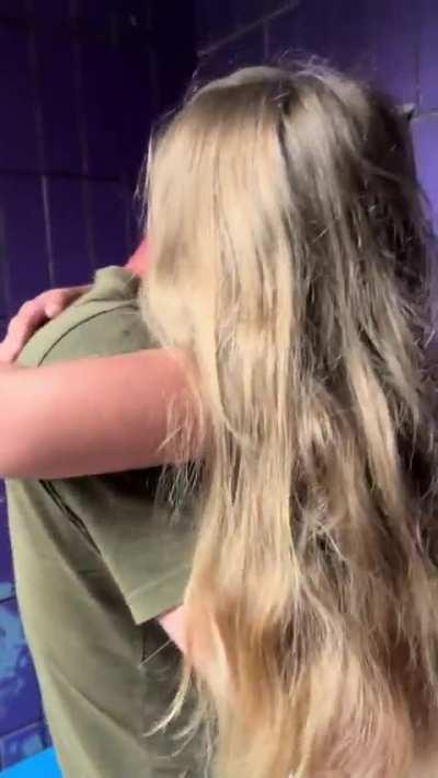 Daughter meets father from the front