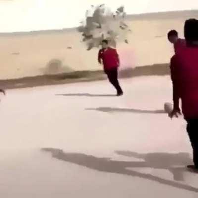 trying to play football.