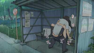 Sheltering from the rain at a bus stop with my kouhai!