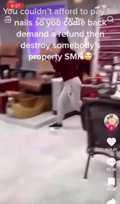 Still asking for her money after they destroyed the shop.