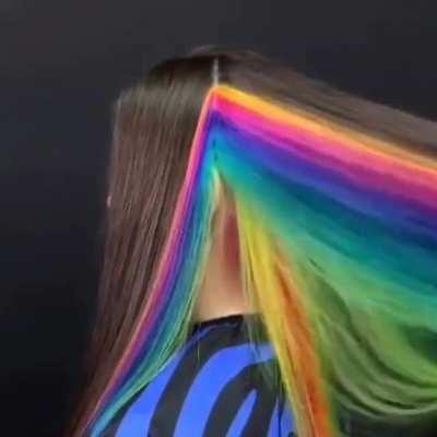 This rainbow hair coloring hidden under her natural hair