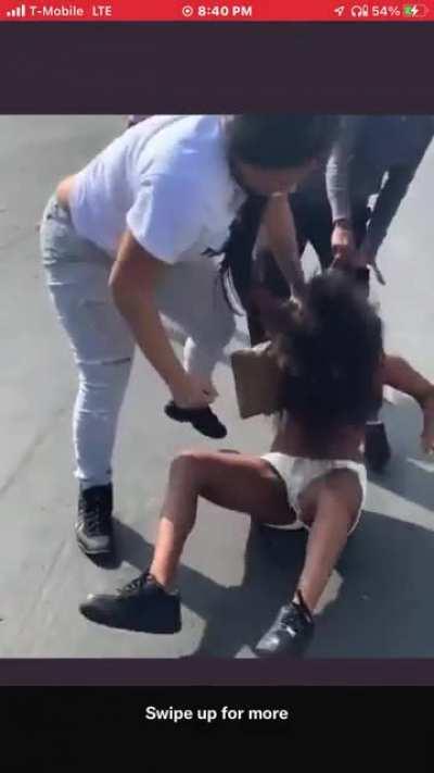 Girl in jeans gets her lick back. After the girl in shorts stabbed her.