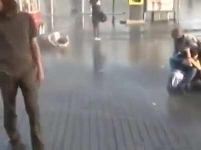 Tough guy vs water cannon