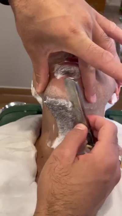 Perfectly shaving a beard asmr