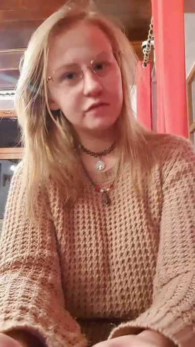 Modest girl in a modest sweater in a restaurant and under the sweater modest boobs. Kisses