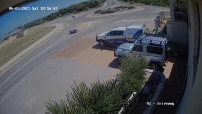 Guy runs motorbike into sign and falls down in Australia