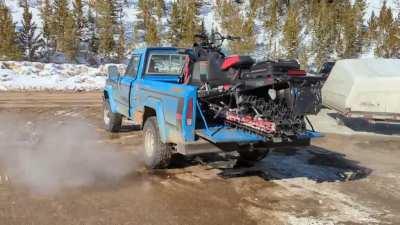 Over 401 cubic inches of American displacement, boys. EFI conversion brings the buff horses even at 'tude. Bonus content for the sledheads is a two-stroke 850cc in the bed