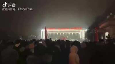 Chinese people marching to the local government building, protesting demanding the end of COVID lock down 11/25/22